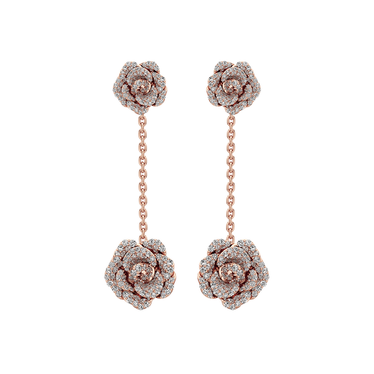 Rose gold rose-shaped earrings on a white background