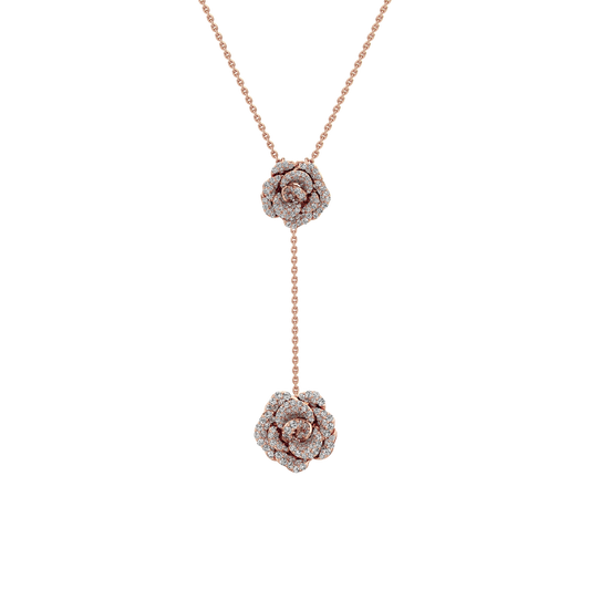 Rose gold necklace with diamond flower pendants on a white background