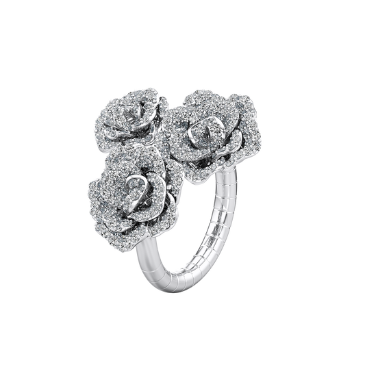Silver ring with rose-shaped diamond designs on a white background