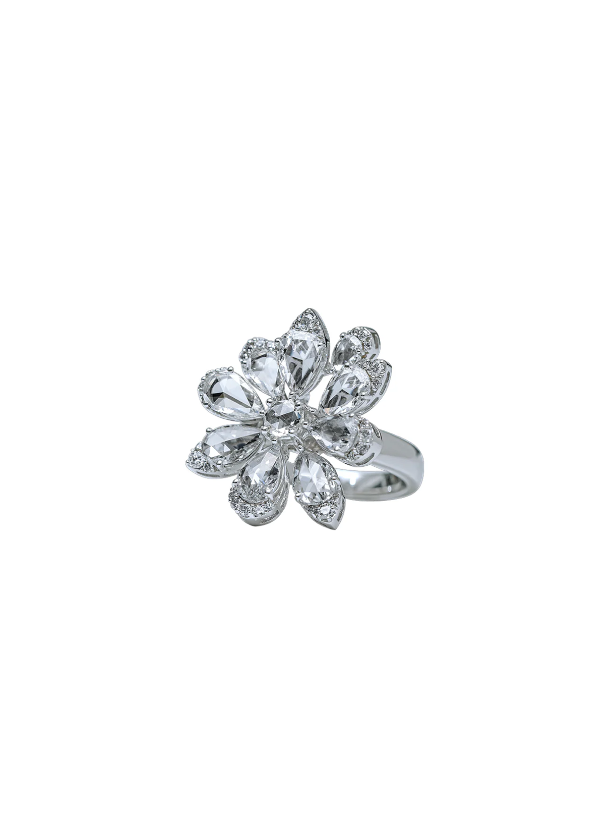 white gold ring with a floral design and natural diamond