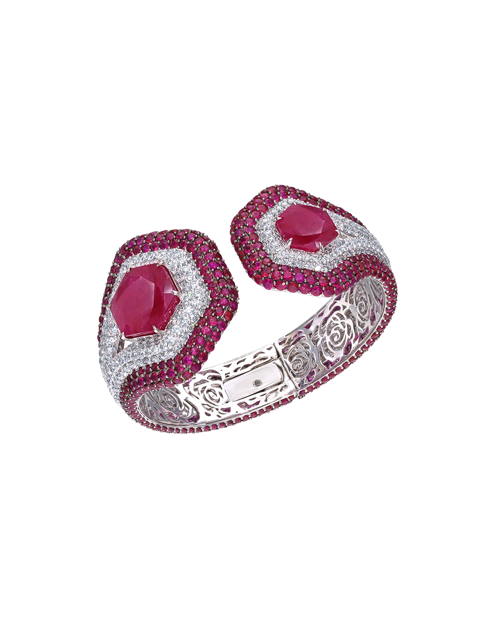 Ornate bracelet with pink gemstones and silver detailing on a white background