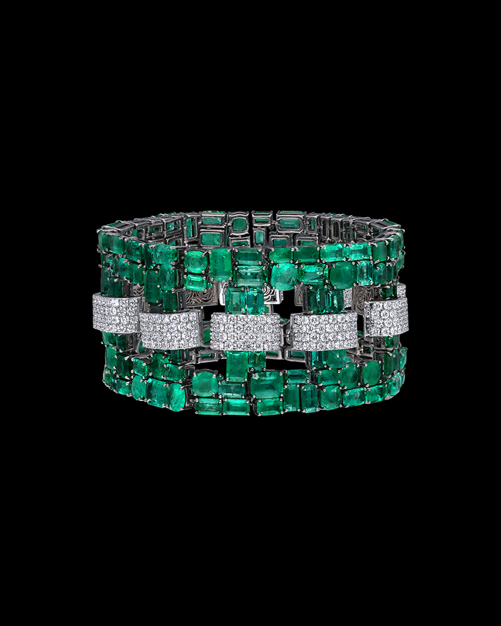 Luxury emerald and diamond bracelet on a black background